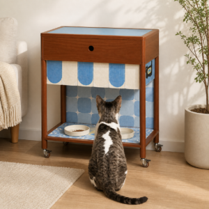 Cat using the open lower bay of the nookmew Purr Pantry feeding station